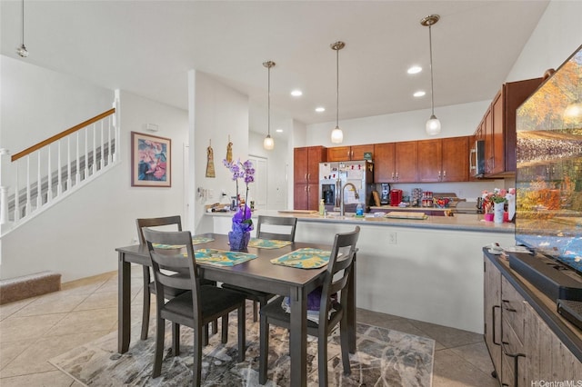 1166 Kukulu St Unit 706, Kapolei, HI 96707 - dining space with light tile patterned flooring, stairs, and recessed lighting