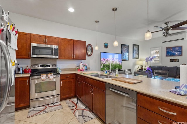 1166 Kukulu St Unit 706, Kapolei, HI 96707 - kitchen featuring stainless steel appliances, a sink, a wall mounted air conditioner, light countertops, and recessed lighting