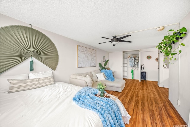 1060 Kamehameha Hwy Unit 2901A, Pearl City, HI 96782 - bedroom with a textured ceiling, wood finished floors, and ceiling fan