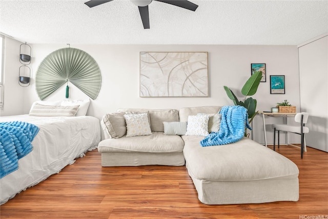 1060 Kamehameha Hwy Unit 2901A, Pearl City, HI 96782 - bedroom with wood finished floors, a textured ceiling, and ceiling fan
