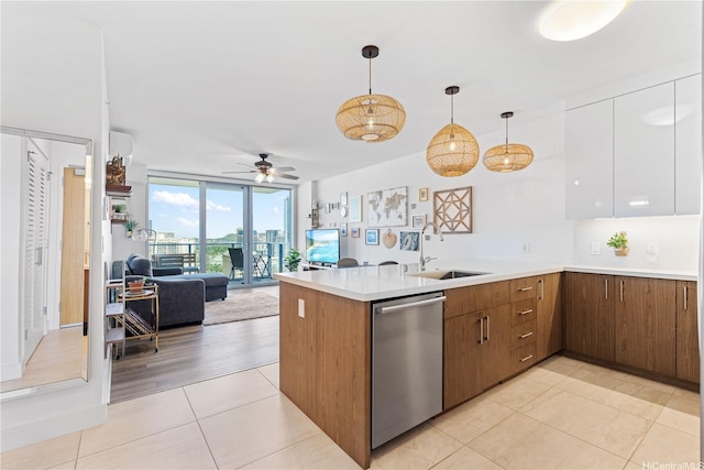 629 Keeaumoku St Unit 2505, Honolulu, HI 96814 - kitchen featuring dishwasher, a peninsula, a sink, light tile patterned floors, and a ceiling fan