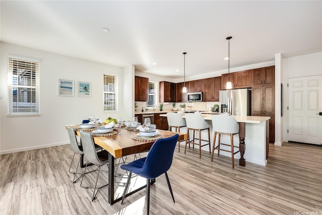 84-814 Maiola St Unit 39, Waianae, HI 96792 - dining area with light wood-style floors, plenty of natural light, baseboards, and recessed lighting