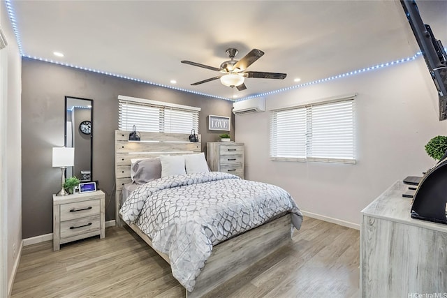 94-1090 Kuhaulua St, Waipahu, HI 96797 - bedroom with a wall mounted AC, multiple windows, light wood finished floors, recessed lighting, and ceiling fan