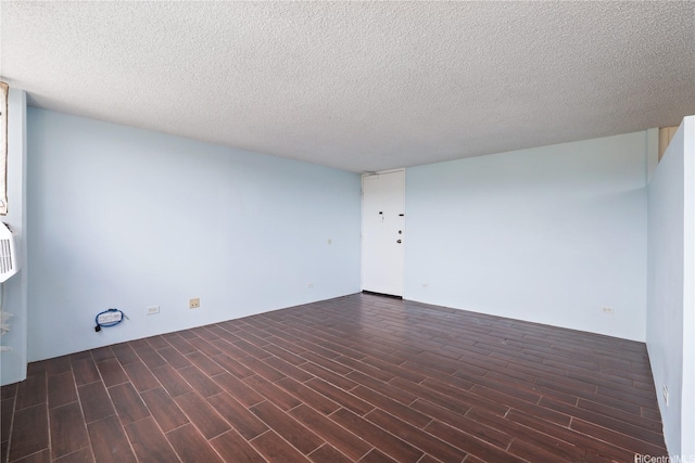 98-288 Kaonohi St Unit 1107, Aiea, HI 96701 - spare room with wood finished floors and a textured ceiling