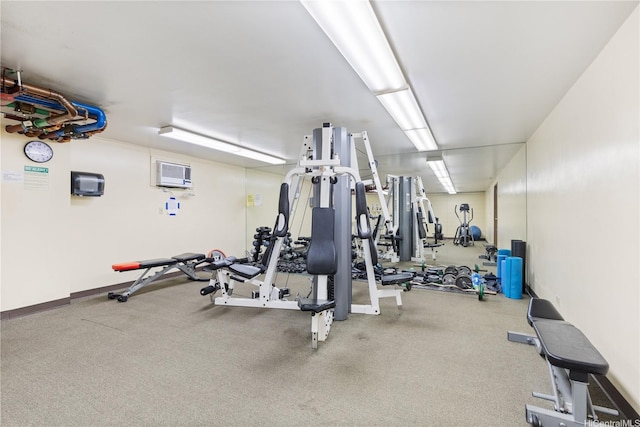 98-288 Kaonohi St Unit 1107, Aiea, HI 96701 - gym with carpet flooring and a wall mounted AC