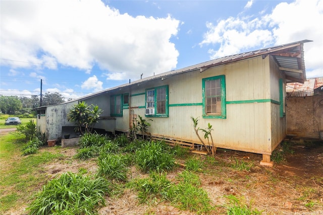 729 Nui Ave, Wahiawa, HI 96786 - view of home's exterior featuring metal roof