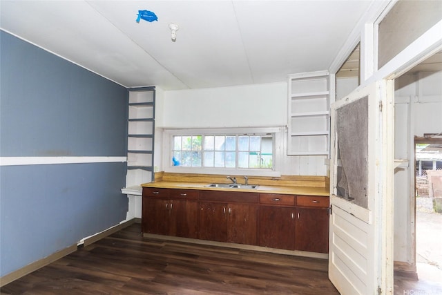 729 Nui Ave, Wahiawa, HI 96786 - kitchen with dark wood finished floors, a sink, light countertops, and dark brown cabinetry