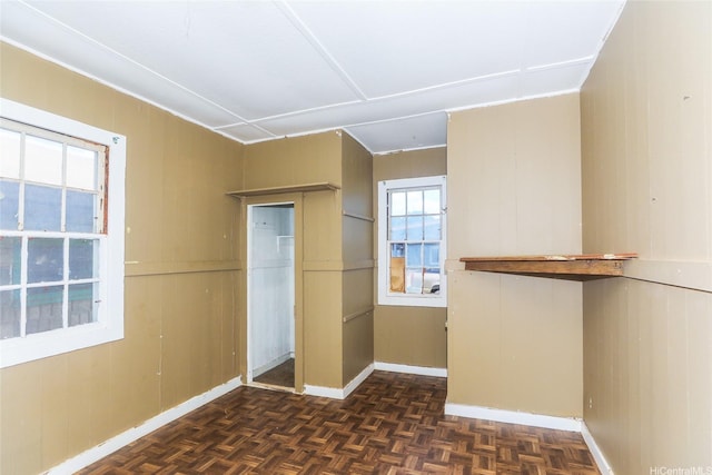 729 Nui Ave, Wahiawa, HI 96786 - unfurnished bedroom with baseboards and wooden walls