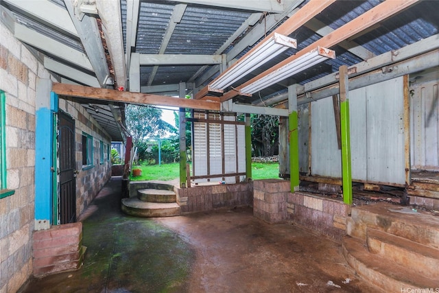 729 Nui Ave, Wahiawa, HI 96786 - miscellaneous room with concrete block wall and concrete floors