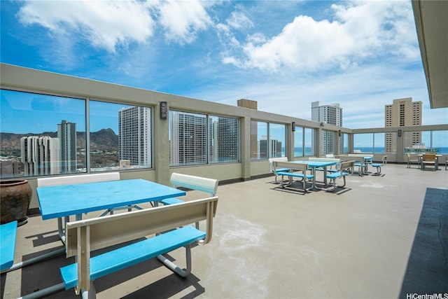 2452 Tusitala St Unit 705, Honolulu, HI 96815 - view of patio / terrace with outdoor dining space