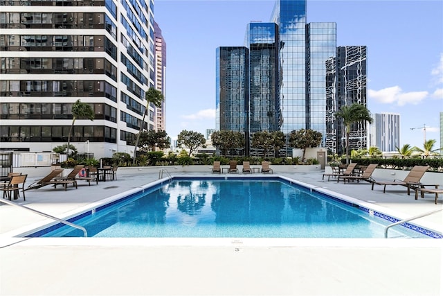 876 Curtis St Unit 1602, Honolulu, HI 96813 - community pool featuring a view of city and a patio