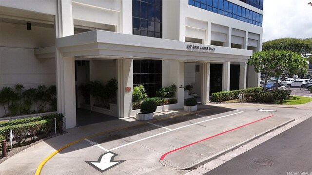 876 Curtis St Unit 1602, Honolulu, HI 96813 - view of exterior entry with uncovered parking