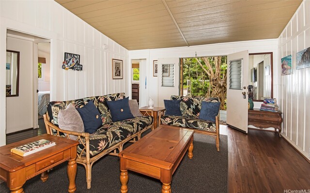 61-365 Kamehameha Hwy, Haleiwa, HI 96712 - living room featuring dark wood finished floors, vaulted ceiling, a decorative wall, and wooden ceiling