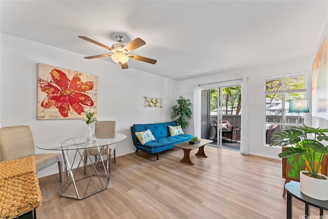 95-798 Wikao St Unit S104, Mililani, HI 96789 - living area with light wood-type flooring, ceiling fan, and baseboards