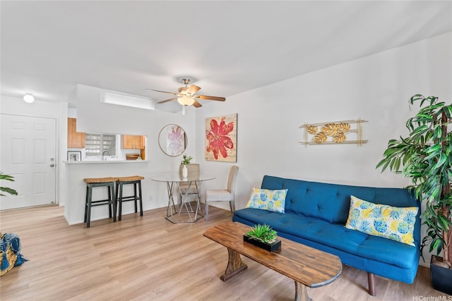 95-798 Wikao St Unit S104, Mililani, HI 96789 - living area with wood finished floors and ceiling fan