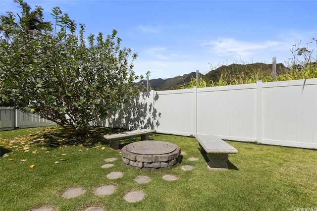53-440 Kamehameha Hwy Unit 8, Hauula, HI 96717 - view of yard featuring an outdoor fire pit and a mountain view