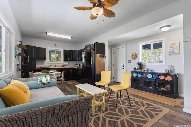 53-440 Kamehameha Hwy Unit 8, Hauula, HI 96717 - living area featuring dark wood finished floors and ceiling fan