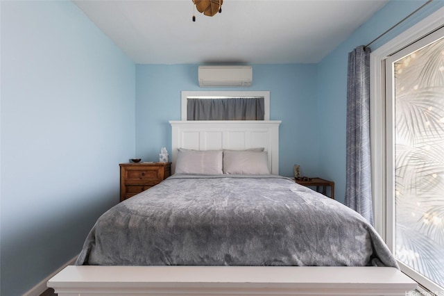 53-440 Kamehameha Hwy Unit 8, Hauula, HI 96717 - bedroom with a wall unit AC, multiple windows, and ceiling fan