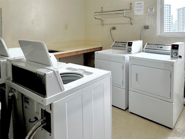 1655 Makaloa St Unit 705, Honolulu, HI 96814 - shared laundry with washing machine and dryer and light flooring
