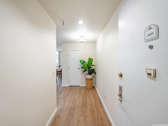 725 Kapiolani Blvd Unit 1105, Honolulu, HI 96813 - hall featuring light wood finished floors and baseboards