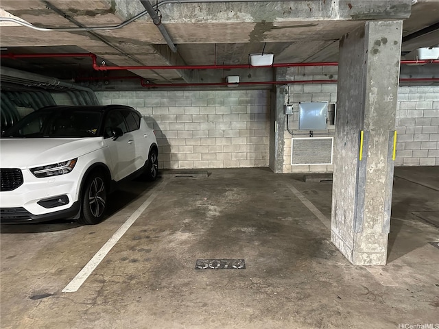 725 Kapiolani Blvd Unit 1105, Honolulu, HI 96813 - parking garage with concrete block wall