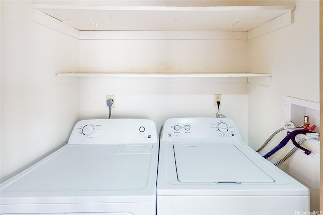 5080 Likini St Unit 518, Honolulu, HI 96818 - washroom featuring separate washer and dryer
