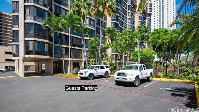 5080 Likini St Unit 518, Honolulu, HI 96818 - view of apartment building / complex with uncovered parking