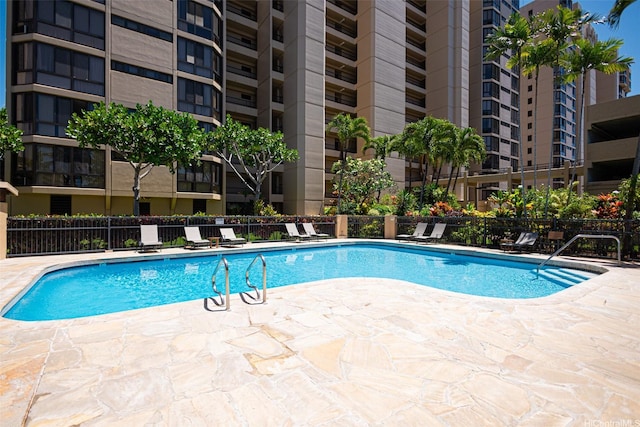 5080 Likini St Unit 518, Honolulu, HI 96818 - community pool featuring a patio area