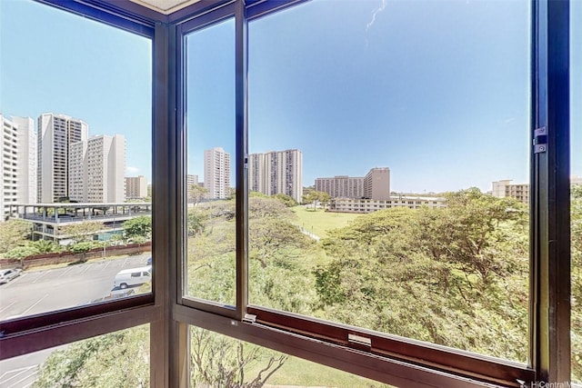 5080 Likini St Unit 518, Honolulu, HI 96818 - unfurnished sunroom with a city view