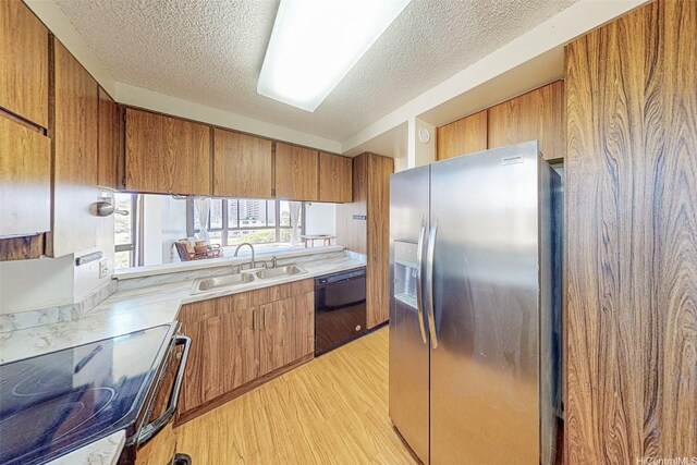 5080 Likini St Unit 518, Honolulu, HI 96818 - kitchen featuring stainless steel fridge with ice dispenser, dishwasher, brown cabinetry, range with electric cooktop, and a sink