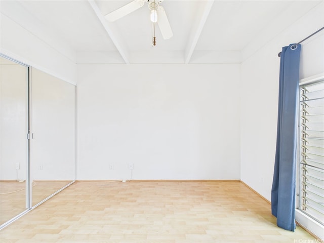 94-425 Lanikuhana Pl Unit 1100, Mililani, HI 96789 - unfurnished bedroom with beam ceiling, light wood-type flooring, ceiling fan, and a closet