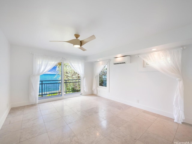 756 Mokulua Dr, Kailua, HI 96734 - tiled empty room featuring a wall mounted AC and ceiling fan