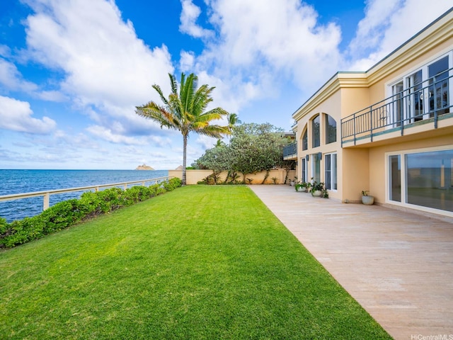756 Mokulua Dr, Kailua, HI 96734 - fenced backyard with a water view, a balcony, and a patio area