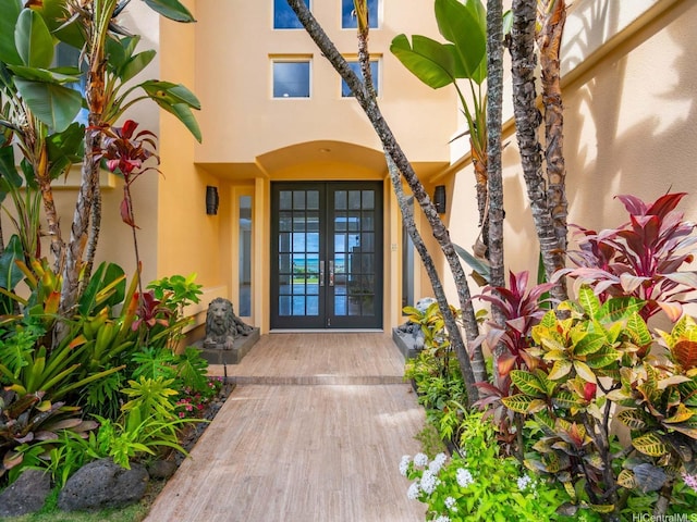 756 Mokulua Dr, Kailua, HI 96734 - entrance to property with french doors and stucco siding