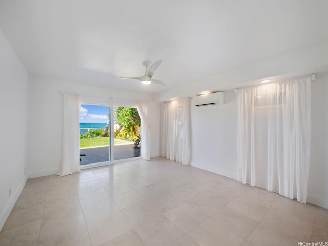 756 Mokulua Dr, Kailua, HI 96734 - empty room featuring a wall mounted air conditioner, ceiling fan, and light tile patterned floors