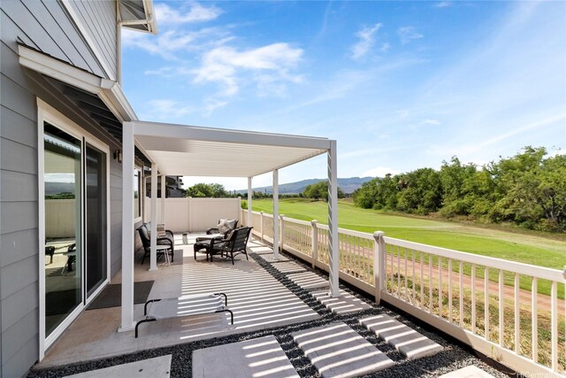 91-1123 Hokua St, Ewa Beach, HI 96706 - deck with a patio, a mountain view, an outdoor hangout area, and a lawn