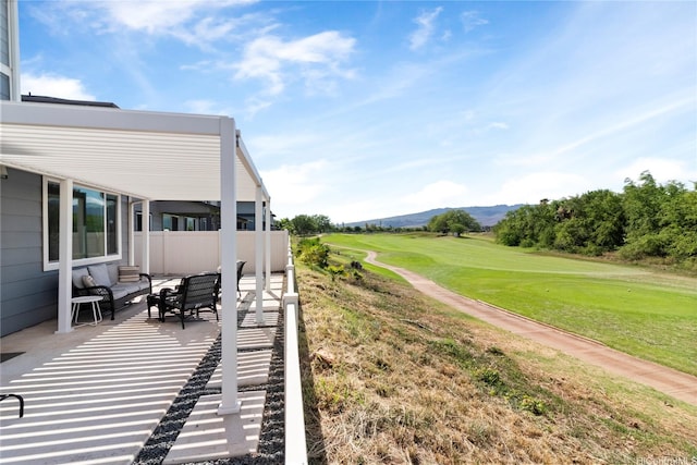 91-1123 Hokua St, Ewa Beach, HI 96706 - wooden terrace with golf course view, a mountain view, and a patio area