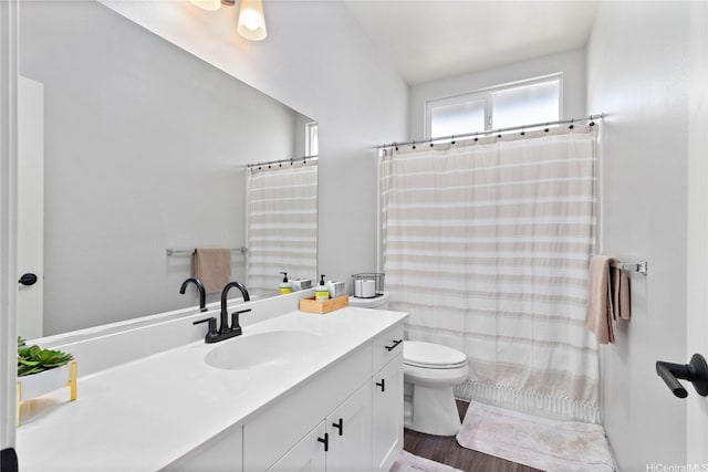 91-1123 Hokua St, Ewa Beach, HI 96706 - full bath featuring vanity, wood finished floors, toilet, and a shower with shower curtain
