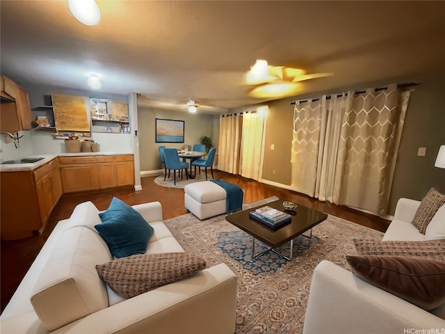 94-328 Hakamoa St, Mililani, HI 96789 - living room featuring dark wood-style floors, ceiling fan, and baseboards