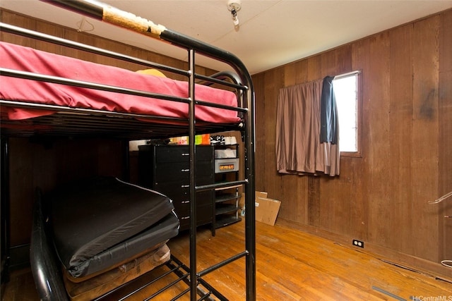 756 Iaukea St, Honolulu, HI 96813 - bedroom featuring wood finished floors and wooden walls