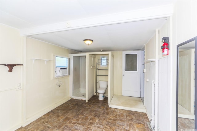 725 Kalolina Pl, Kailua, HI 96734 - full bathroom featuring toilet, a shower stall, and stone finish floors