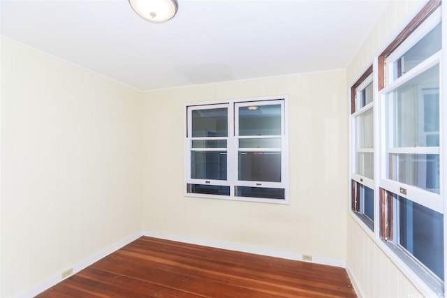 725 Kalolina Pl, Kailua, HI 96734 - empty room with dark wood finished floors and baseboards