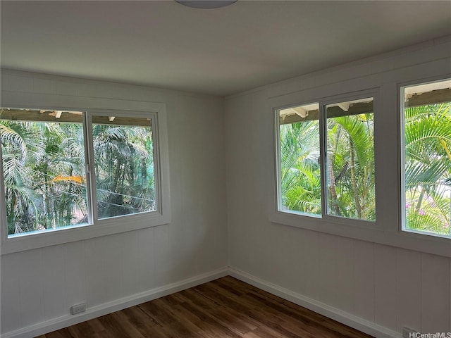 252 Moomuku Pl Unit 4, Honolulu, HI 96821 - spare room with dark wood-type flooring and baseboards