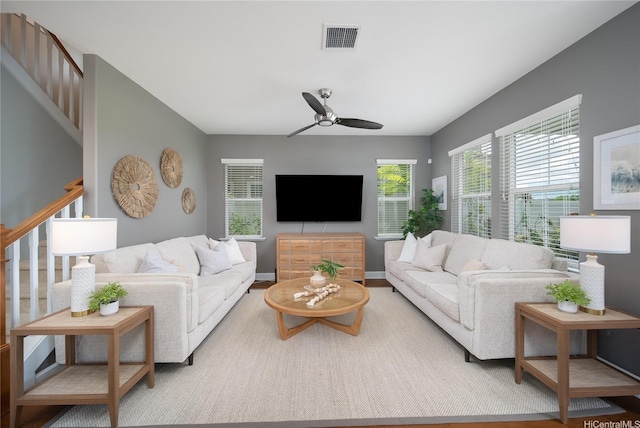 91-1124 Kai Oio St, Ewa Beach, HI 96706 - living room featuring stairway, a ceiling fan, and baseboards