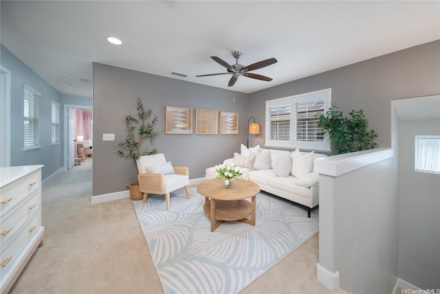91-1124 Kai Oio St, Ewa Beach, HI 96706 - living area featuring light colored carpet, ceiling fan, baseboards, and recessed lighting