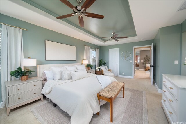 91-1124 Kai Oio St, Ewa Beach, HI 96706 - bedroom featuring light colored carpet, a tray ceiling, baseboards, and ceiling fan