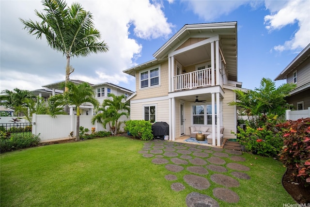 91-1124 Kai Oio St, Ewa Beach, HI 96706 - back of property with a balcony, a patio, and ceiling fan