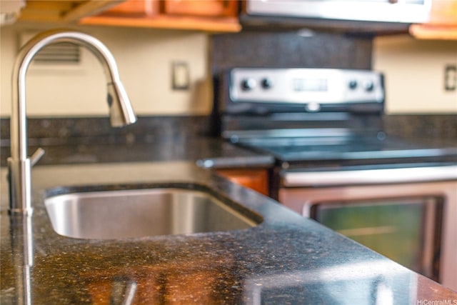 84-965 Farrington Hwy Unit B216, Waianae, HI 96792 - kitchen view of a sink and stainless steel range with electric stovetop