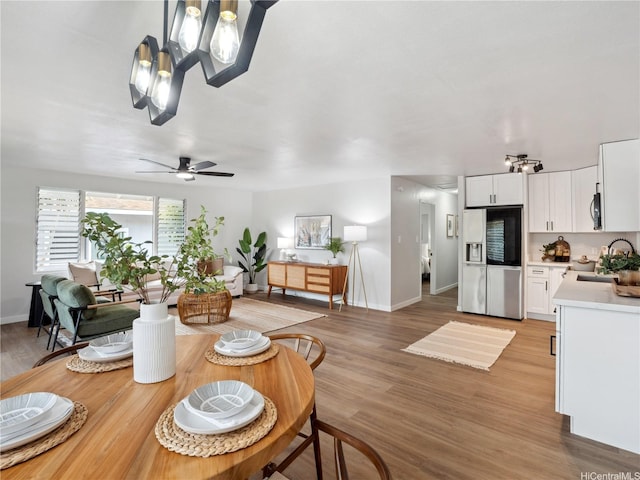 87-153 Kimo St, Waianae, HI 96792 - dining space featuring baseboards and light wood-style flooring