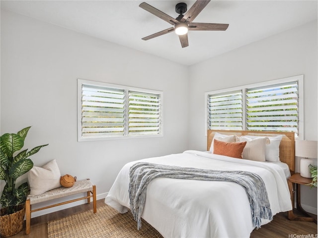 87-153 Kimo St, Waianae, HI 96792 - bedroom featuring multiple windows, wood finished floors, and baseboards